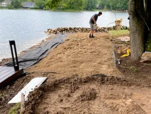 SandMat 12.5 x 100 ft Shoreline Beach & Landscape Fabric for Sand Retention, Erosion & Weed Control - HeavyDuty Geotextile Fabric Perfect for Lakefronts, Beaches & Waterfronts